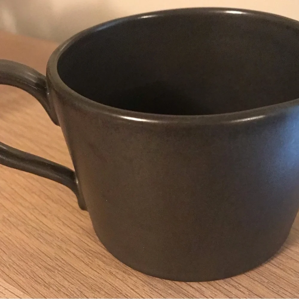 Black Anthropologie iridescent ceramic tea cup